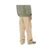 Calças Carhartt WIP Landon em bege, vista traseira no modelo
