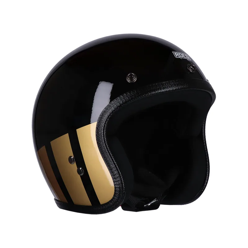 Capacete Roeg Jett Curbstone Gold, preto com faixas douradas, vista de três quartos.